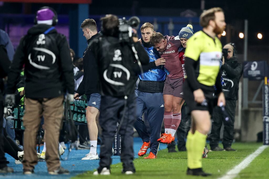Munster's Craig Casey being carried off with a knee injury during the Champions Cup game against Castres. Photograph: Ben Brady/Inpho