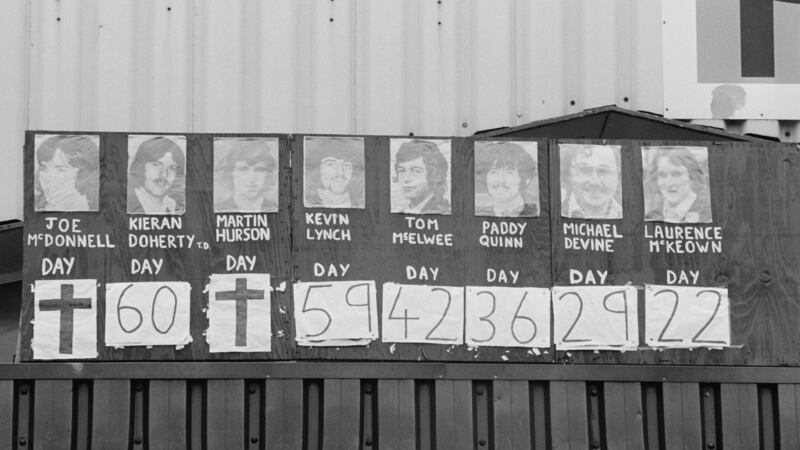 Portraits of imprisoned hunger strike participants hang on the wall of a building. Under each photograph, a number indicated the days each participant had gone without food. The crosses signaled the death of two strikers who died within months of Bobby Sands’s passing. Photograph: Jean-Louis Atlan/Sygma via Getty Images