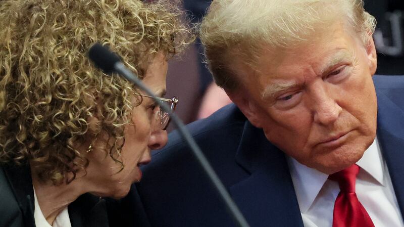 Donald Trump talks to attorney Susan Necheles. Photograph: Brendan McDermid-Pool/Getty Images