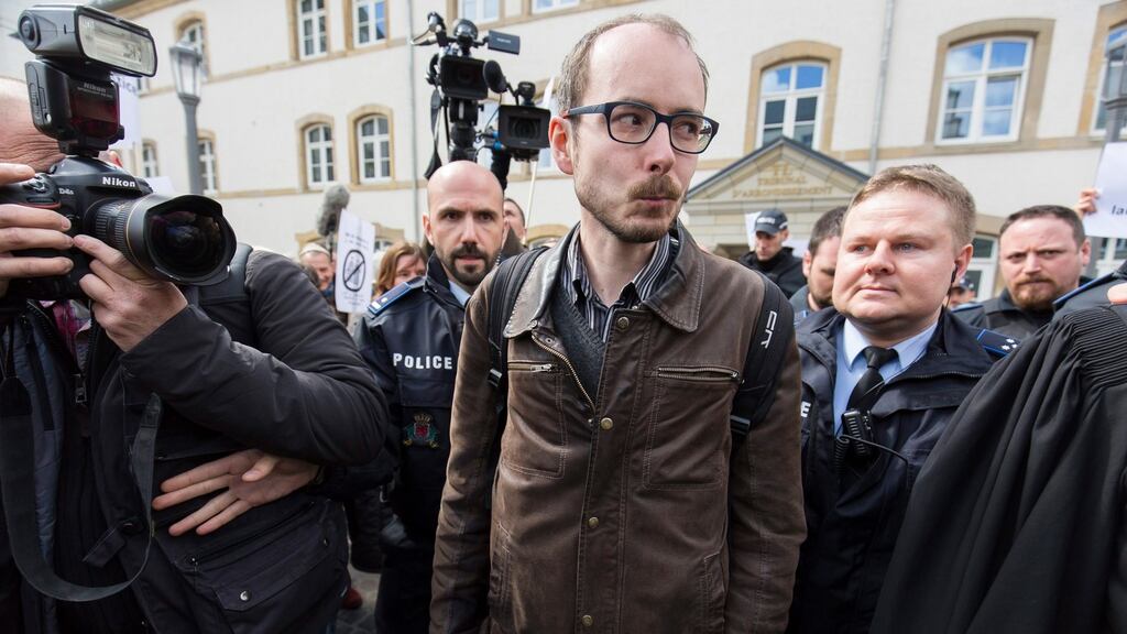 Former employee of PricewaterhouseCoopers, Antoine Deltour leaves court on the first day of the LuxLeaks whistleblower trial in Luxembourg Photograph: Julien warnand/EPA