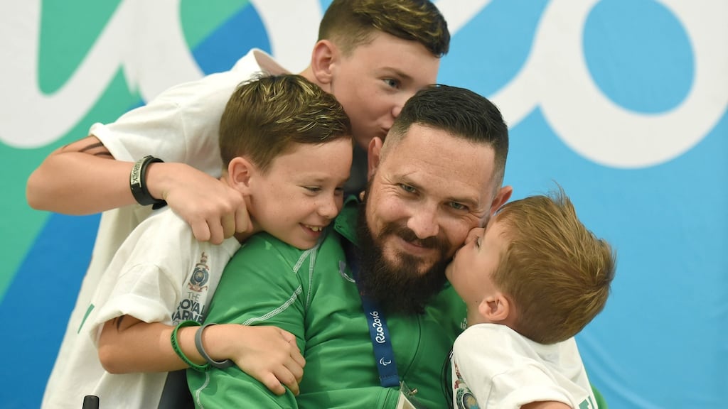 Phillip Eaglesham with his three sons Tyler, aged 9, Travis, aged 13, and Mason, aged 6. Photograph: Sportsfile