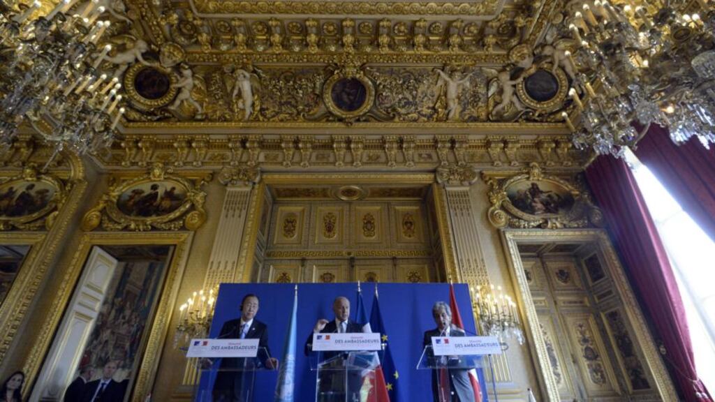 UN secretary general Ban Ki-Moon, French foreign minister Laurent Fabius and Peruvian environment minister Manuel Pulgar Vidal in Paris yesterday. Photograph: Miguel Medina/AFP/Getty