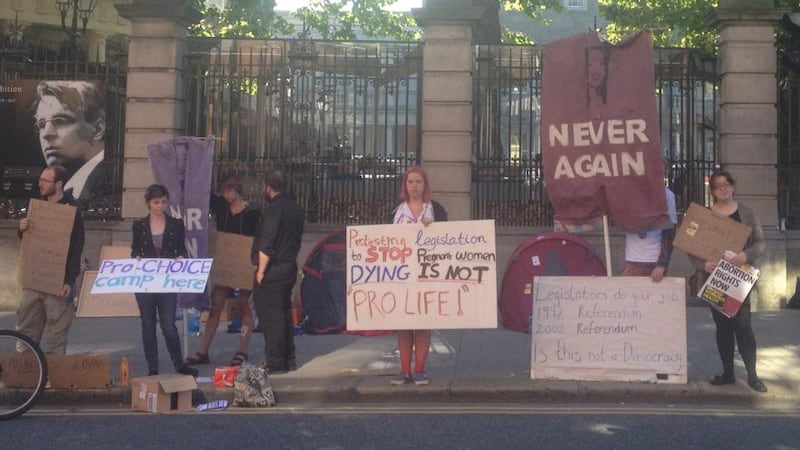 Pro-choice protesters outside the Dail.