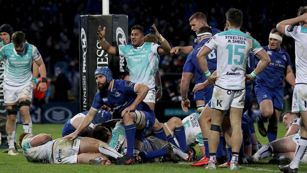 Luke McGrath crosses for Leinster in their narrow win over Connacht. Photograph: Dan Sheridan/Inpho