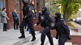 Russian opposition under pressure amid fresh raids and accusations