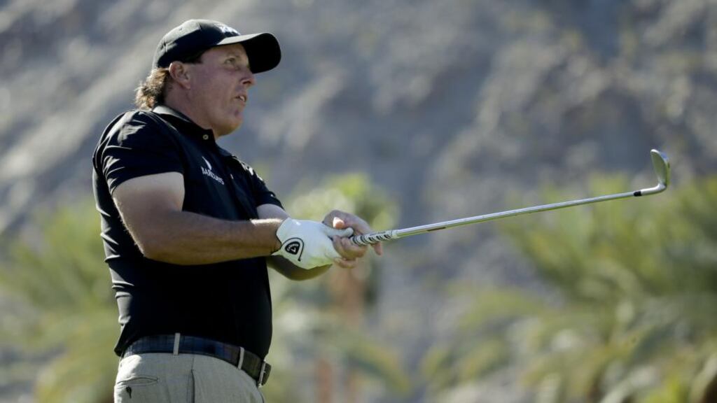 Phil Mickelson looks to be out of contention with a tightly packed leaderboard in the Humana Challenge. (AP Photo/Chris Carlson)