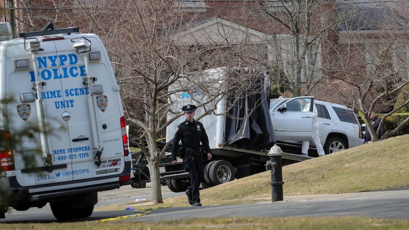 New York City police crime scene investigators work at the scene where reported New York mafia Gambino family crime boss, Francesco “Franky Boy” Cali, was killed outside his home in Staten Island. Photograph: Brendan McDermid/Reuters