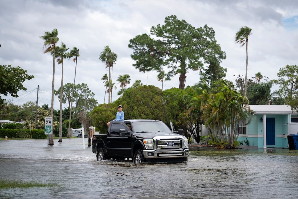 A truck drives through flood waters on a road ahead of Hurricane Helene in St Petersburg, Florida. Forecasters have warned that the storm could bring 'catastrophic' flooding along the Gulf Coast. Photograph: New York Times