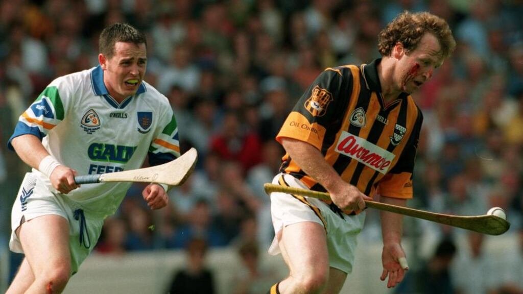 Willie O’Connor of Kilkenny holds possession ahead of Waterford’s Anthony Kirwan during the All-Ireland SHC semi-final of 1998 at Croke Park. Photograph: Lorraine O’Sullivan/Inpho.