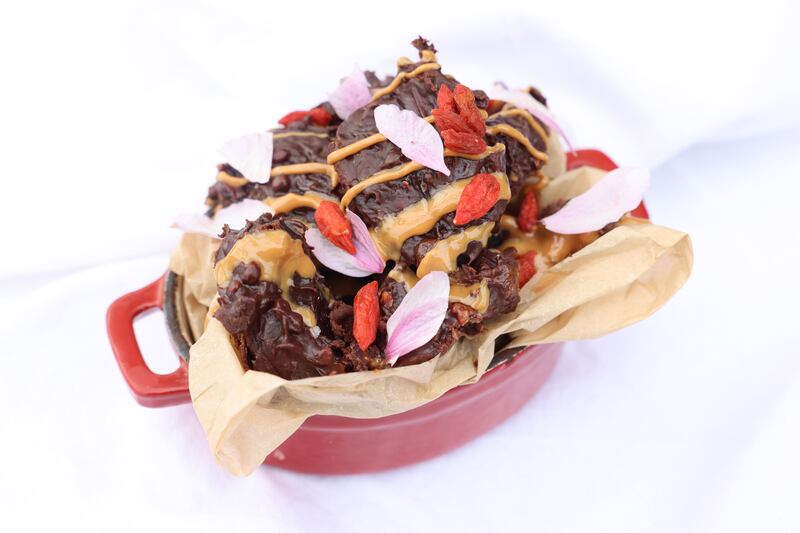 Sugar-free treats: Medjool dates, stuffed with blitzed peanuts and sea salt, topped with a banana slice, dipped in homemade chocolate, then frozen. It is like a Snickers bar but better. Photograph: Dara Mac Dónaill