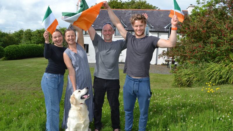 Olympic Gold Medalist Fintan McCarthy’s family Sue, Tom, Caitin and Jake with Albie the golden retriever as they celebrate Fintan’s and Paul O’Donovan’s Olympic Gold Medal victory at home at Aughadown, West Cork. Photograph: Anne Minihane.