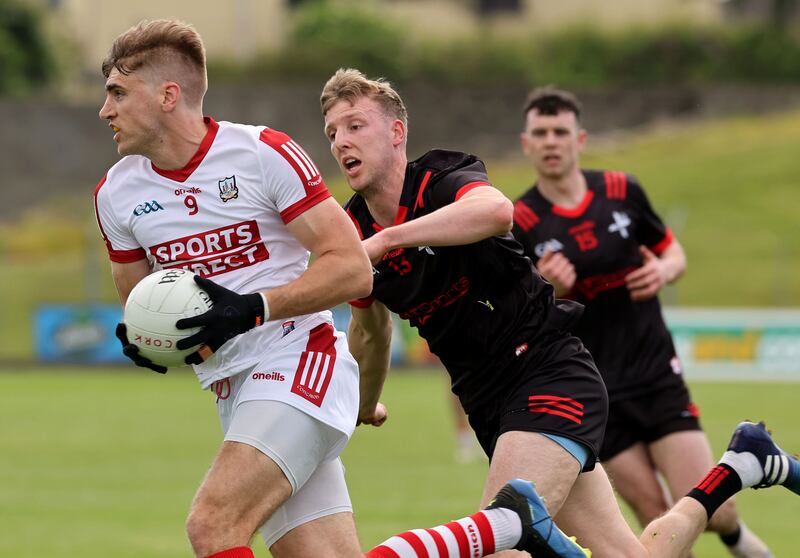 Cork's Ian Maguire gets away from Louth's Paul Matthews during the clash at Navan. Photograph: Lorraine O'Sullivan/Inpho