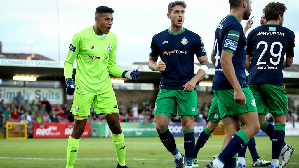 Gavin Bazunu celebrates his penalty save as Shamrock Rovers held Cork City to a draw at Turner’s Cross. Photograph: Ryan Byrne/Inpho