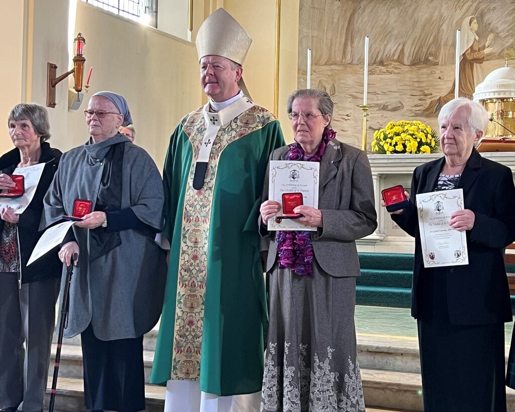 Sisters Agnes, Carmel, Colette and Rose with Catholic Primate Archbishop Eamon Martin at the service on Sunday. Photograph St Peter's Parish/Facebook