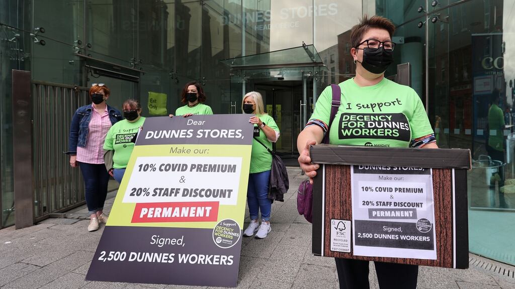 Dunnes Stores workers deliver an oversized pay petition to Dunnes Stores head office on Georges Street, Dublin in August. Photograph: Nick Bradshaw