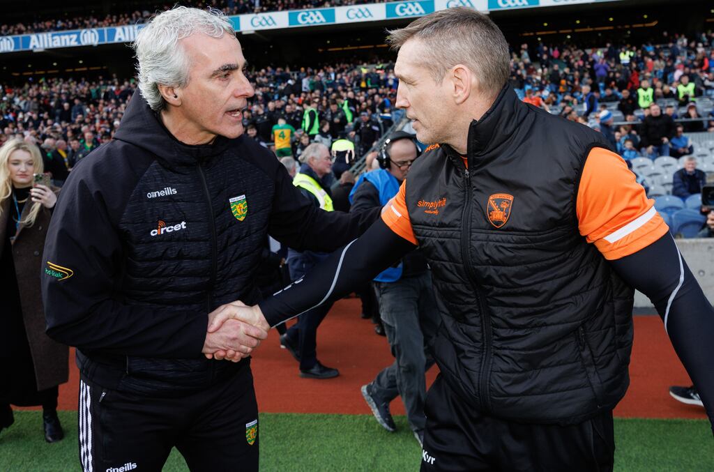Donegal’s manager Jim McGuinness and Armagh's Kieran McGeeney after the Football League Division 2 Final. Photograph: James Crombie/Inpho