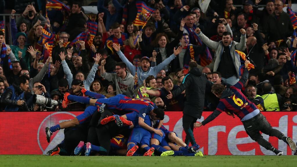 Barcelona players and fans celebrate after Sergi Roberto scored the winner against paris St-Germain. Photo: Albert Gea/Reuters
