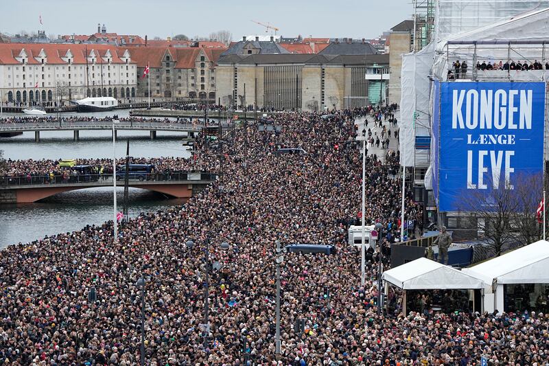 The crowd at Christiansborg during the declaration of abdication of Queen Margrethe II of Denmark. Photograph: Mads Claus Rasmussen/AFP