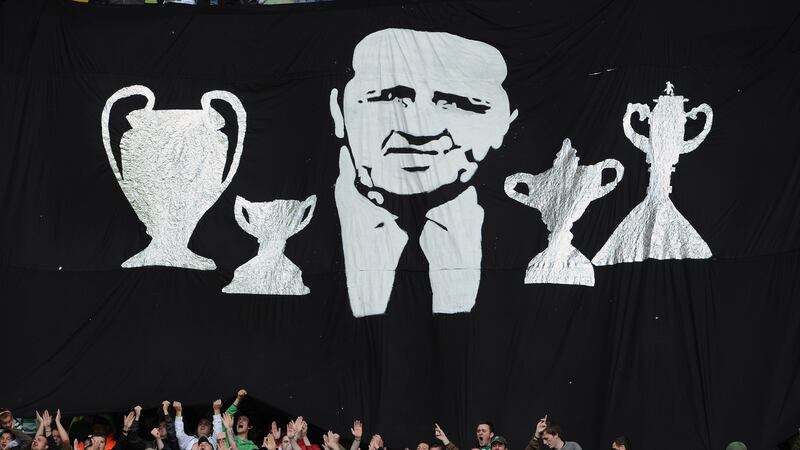 Celtic fans hold a minute’s applause prior to the Premier League match between Celtic and Hearts in 2010 to mark the 25th anniversary of Jock Stein’s death at Celtic Park. Photograph: Photograph: Jeff J Mitchell/Getty Images