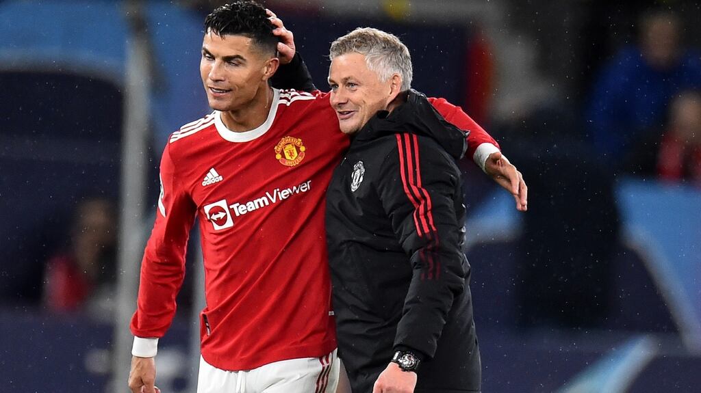 Manchester United’s Cristiano Ronaldo and manager Ole Gunnar Solskjaer celebrate after the Portuguese forward scored a late winner against Villareal on Wednesday at Old Trafford. Photograph: Peter Powell/EPA