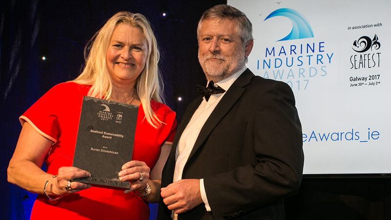 Dr. Dave Jackson, Inspector of Fisheries and manager of the Aquaculture Section in the Marine Institute. presents the Seafood Sustainability Award to Birgitta Hedin-Curtin, Burren Smokehouse.