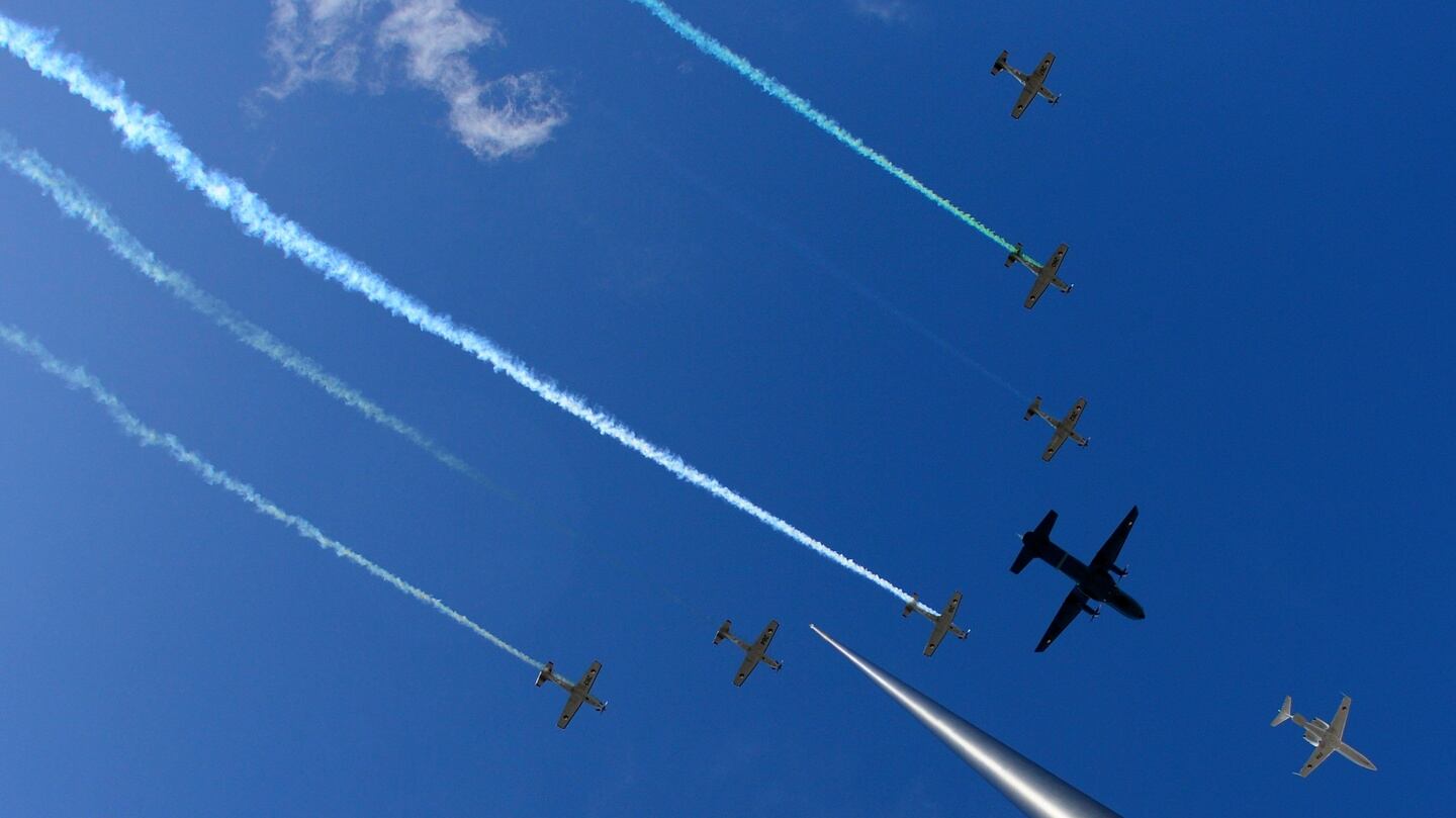 Irish Air Corps fly over Dublin City as part of a 1916 military parade. Photograph: Aidan Crawley /EPA