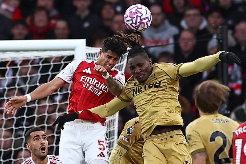 Arsenal's Piero Hincapie vies with Crystal Palace's Christantus Uche. Photograph: Henry Nicholls/AFP via Getty Images