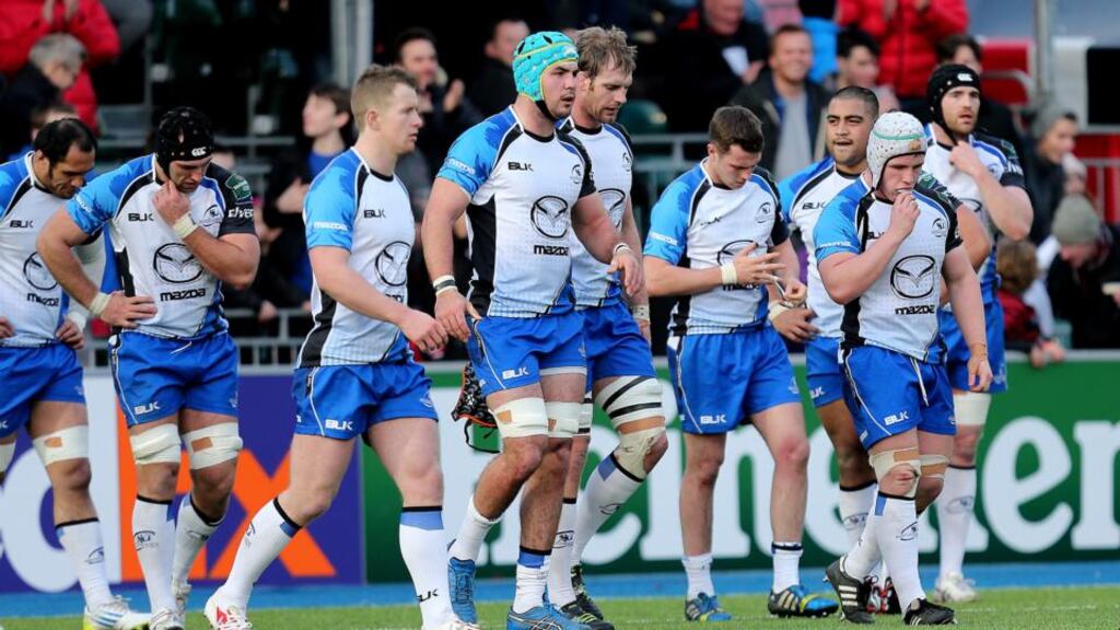 Dejected Connacht players at the final whistle after the Heineken Cup clash with Saracens. Photograph: James Crombie/Inpho