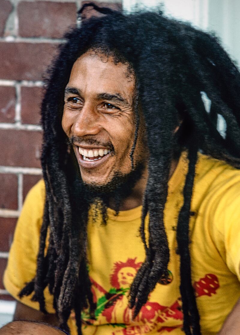 Bob Marley in front of his house at Hope Road, Kingston, Jamaica, in 1979. Photograph: Charlie Steiner/Hwy 67 Revisited/Getty