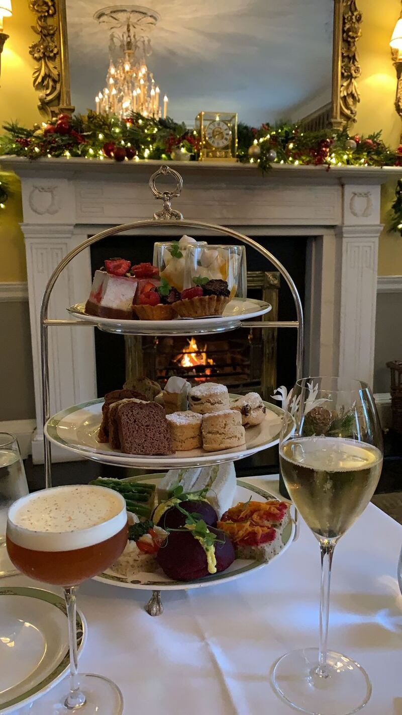 Vegan Afternoon Tea at the Merrion Hotel, with a Irish Maltini, a non-alcoholic cocktail made from Irish malt tea, demerera syrup, and topped with fresh cream, on the left