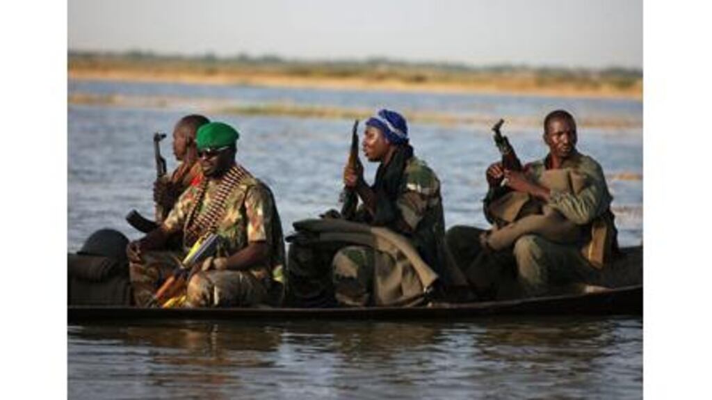 Malian soldiers head for the village of Kadji, which the army said was a stronghold of jihadists until Thursday. A jihadist magazine has warned France to end its military intervention there. Photograph: Joe Penney/Reuters