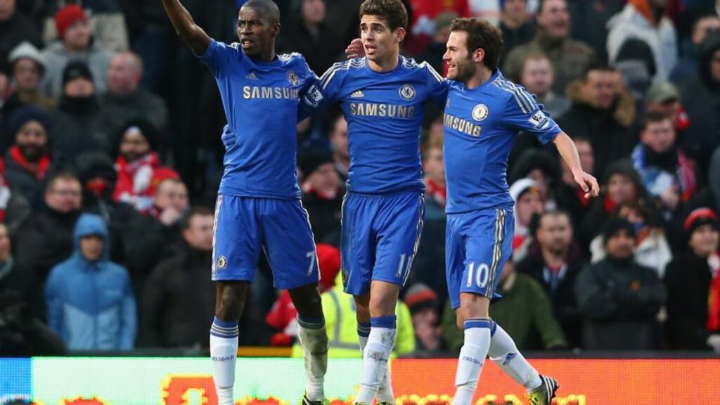 Ramires (l) of Chelsea celebrates scoring his team's second goal oscar and Mata. Photograph: Getty