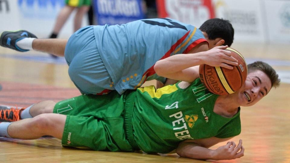 Daragh Gilmartin, St Peter’s Dunboyne, in action against Enguerrad Le Corff, Colaiste Pobail Setanta. All-Ireland Schools Cup U16C Boys Final, St Peter’s Dunboyne v Colaiste Pobail Setanta. Photograph: David Maher/Sportsfile