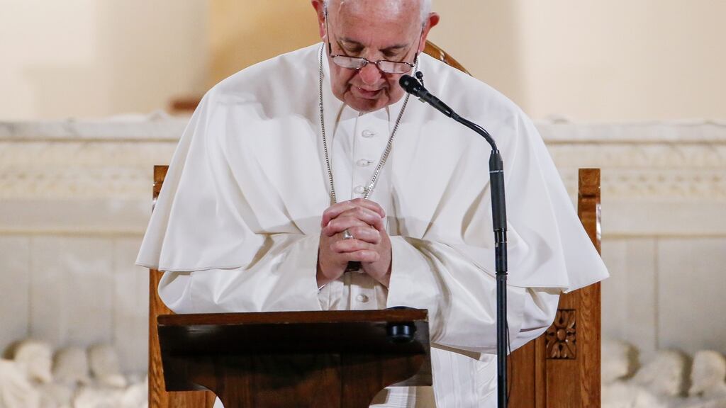Pope Francis prays at St Patrick’s Catholic Church in Washington during his five-day trip to the US. Photograph: Erik S Lesser/EPA