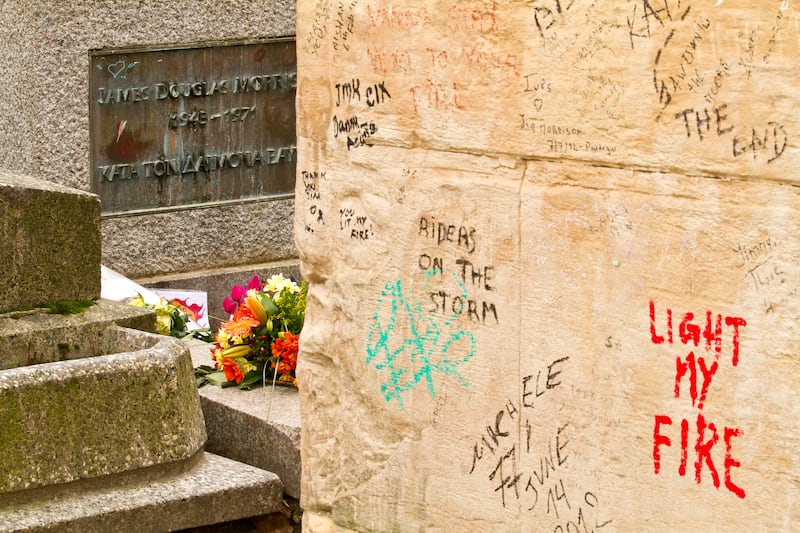 Jim Morrison's grave. Photograph: Getty