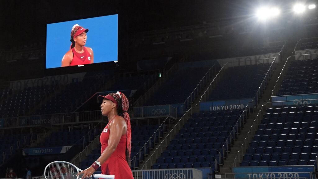 Japan’s Naomi Osaka was beaten by Czech Republic’s Marketa Vondrousova in their women’s singles match at the Tokyo 2020 Olympics. Photo: Tiziana Fabi/AFP via Getty Images