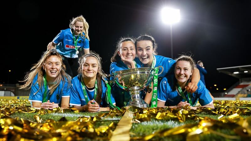 Peamount celebrate with the trophy after the victory over Cork City in the cup final at Tallaght Stadium. Photograph: Tommy Dickson/Inpho