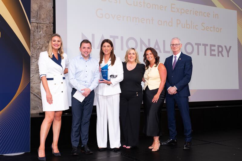Anna Daly, MC of the awards; Shane Kenny, senior national account manager at National Lottery, Emily O’Kane, retail customer experience manager at National Lottery, Therese Case, customer support at National Lottery; Donna Tobin, customer support team lead at National Lottery; and Ian Talbot, chief executive of Chambers Ireland. Photographer: Ruben Morrissey-Fernandez/Ruby Productions