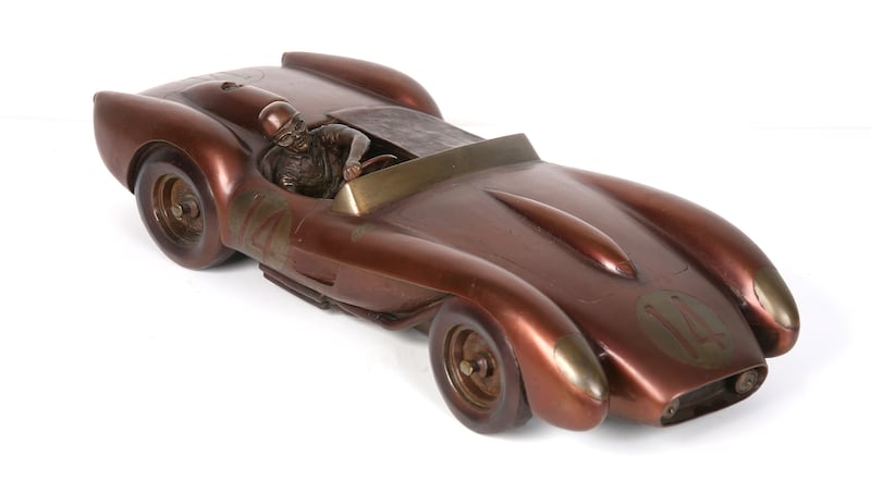 Bronze sculpture of the Ferrari 250 Testa Rossa (TR) sports car by Gordon Chism, at Sheppard's