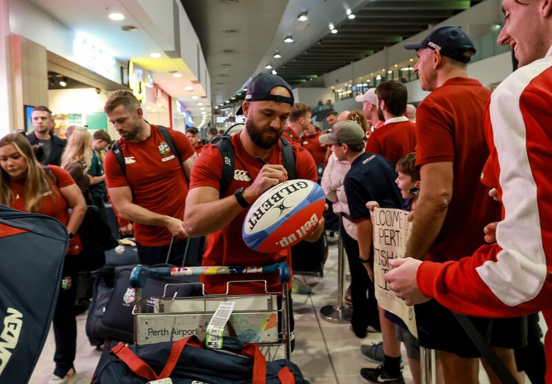 Jamison Gibson-Park signs an autograph for a fan. Photograph: Dan Sheridan/Inpho
