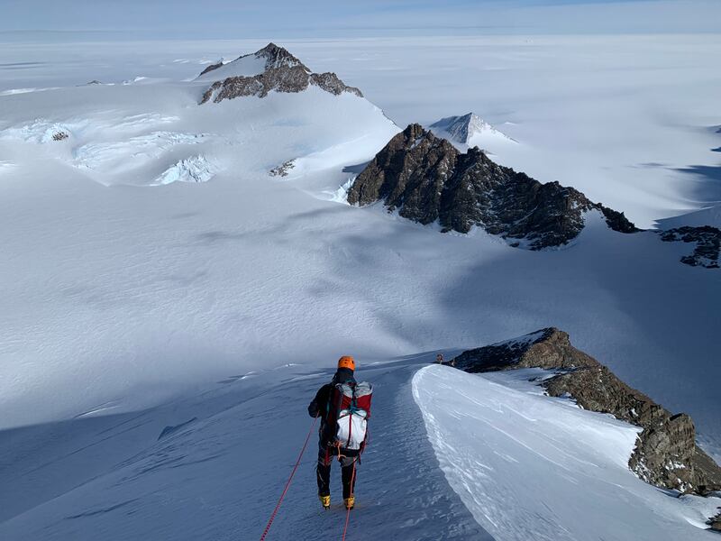 Coming down the fixed line with views from the Mount Vinson summit.