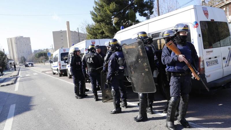Members of the National Security forces (CRS) stand guard near the ‘Cite de la Castellane’ in northern Marseille, France, on Monday. Photograph: EPA