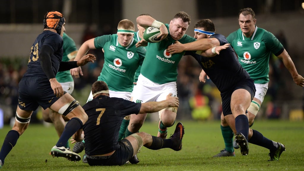 Dave Kilcoyne barges through the Argentina defence of Marcos Kremer and Enrique Pieretto on Saturday evening. Photograph: Dara Mac Dónaill/The Irish Times