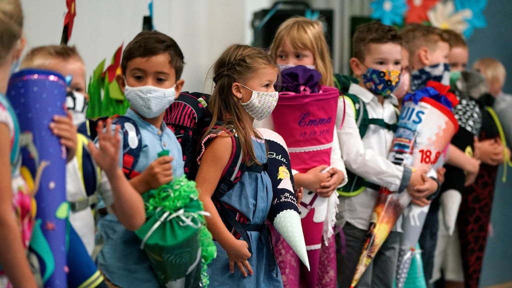 Children attending their first day back in school last Tuesday at a elementary school in Taunusstein near Wiesbaden, Germany Photograh:. EPA/Ronald Wittek