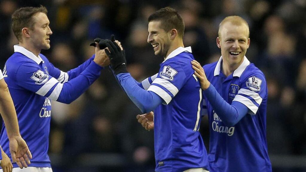 Aiden McGeady (left) and Steven Naismith (right) congratulate Everton team-mate Kevin Mirallas after his goal against Aston Villa. Photograph: Malcolm Couzens/Getty Images