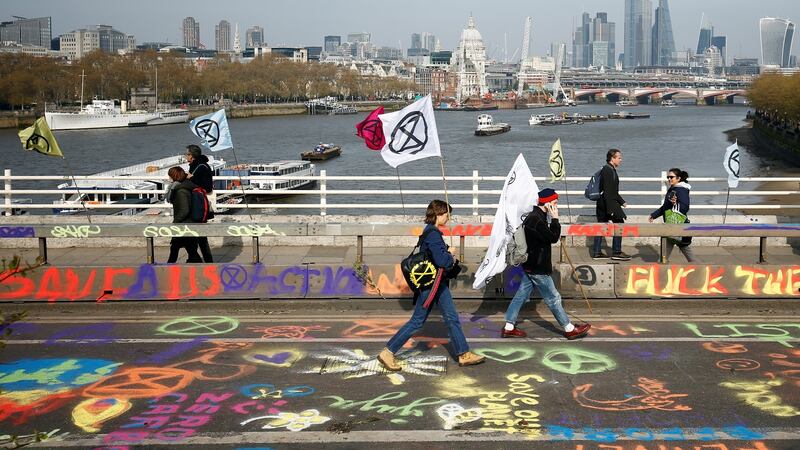 Police were reported to have begun moving the protesters off Waterloo Bridge. Photograph: Henry Nicholls/Reuters
