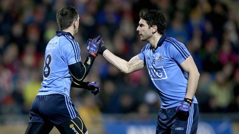 Denis Bastick of Dublin celebrates scoring the first goal of the game with Bernard Brogan. Photograph: Donall Farmer/Inpho