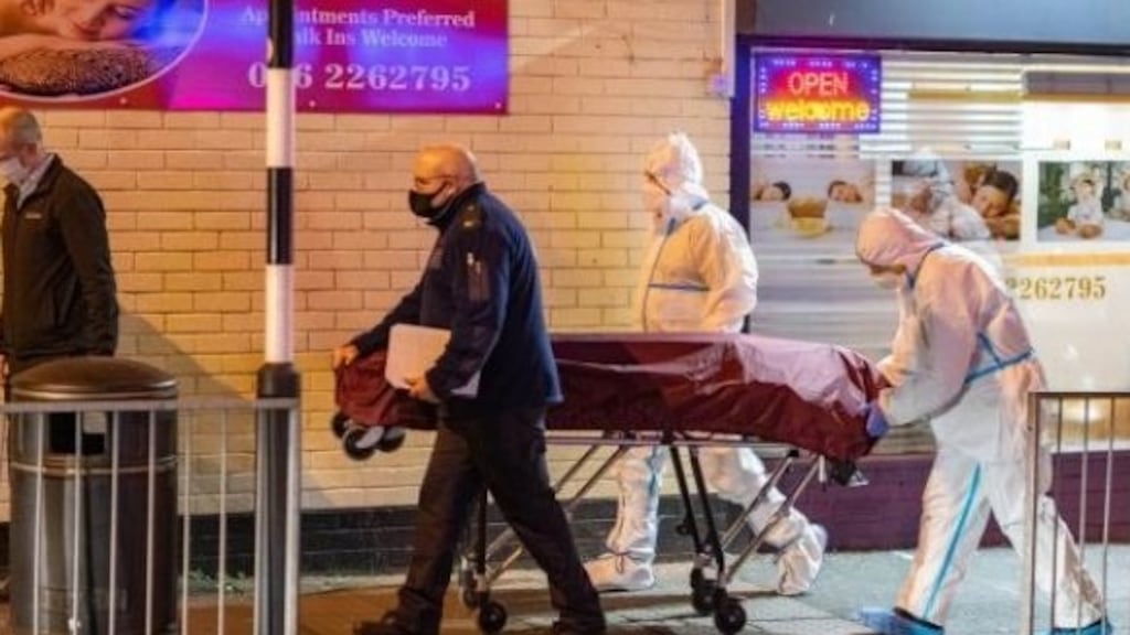 Gardaí removing the body of Peader Doyle from the post office on Staplestown Road in Carlow on Friday. Photograph: Dylan Vaughan