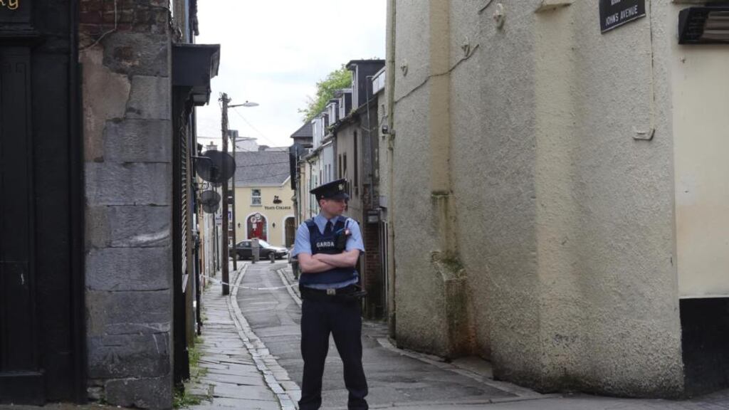 A garda at the scene of a stabbing at John’s Avenue in Waterford city this morning. Picture: Mary Browne