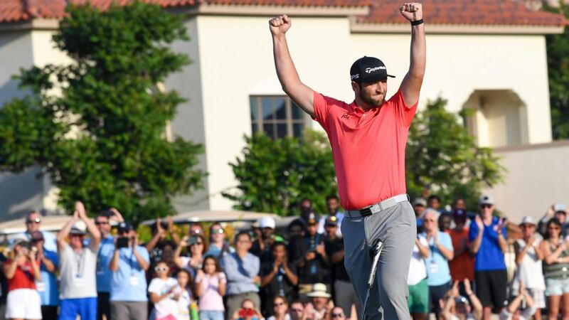 Spain’s Jon Rahm celebrates after winning the Dubai DP World Tour Championship. Photograph: Karim Sahib/AFP via Getty Images